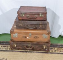 Three leather vintage suitcases and one other