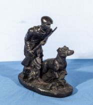 A bronze figure group of a gundog and master 26cm long and 25cm tall