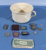 Old obsolete coins and notes together with a chamber pot