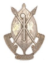 Rhodesian African Rifles Officer's silver cap badge. Good die-cast oval shield bearing crossed