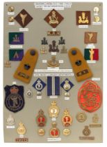 44 6th King's African Rifles and Tanganyika Police badges etc. Board with good display of metal