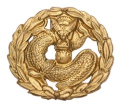 Chinese Labour Corps WW1 cap badge circa 1916-19. Good rare die-pressed brass Dragon resting in