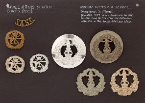 Small Arms School Corps and Queen Victoria School OTC and CCF 8 items of insignia. Good assortment