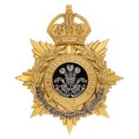 Irish. Leinster Regiment Officer's helmet plate circa 1901-22. Good scarce gilt crowned star