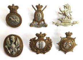 6 Victorian Cavalry cap badges and another; 5th Dragoon Guards ... 6th Dragoon Guards ... 7th