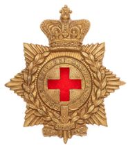 Medical Staff Victorian glengarry cap badge circa 1884-98. Good scarce die-stamped brass crowned