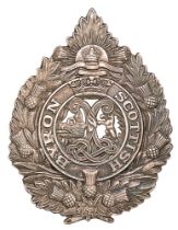 Australian Byron Scottish glengarry cap badge circa 1930-42. Good die-stamped silvered example based