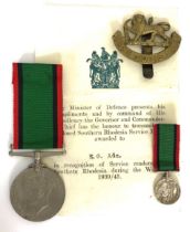 WW2 Attributed Southern Rhodesia War Service Medal and Issue Slip. This rare example is attributed