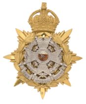 Badge. Border Regiment Officer's helmet plate circa 1901-14. Fine scarce gilt crowned star mounted