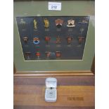 Framed and glazed collection of miniature Rover car badges and a boxed tie pin Location: