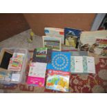 A mixed lot of sporting memorabilia, children's toys, books and other items to include two Simon