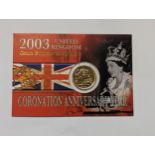 Queen Elizabeth 1952-2022 - a full sovereign dated 2003, in a Royal Mint presentation card,