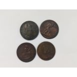 A group of four tokens to include 1793 Leeds halfpenny, 1793 Manchester halfpenny, 'Am I Not A Man