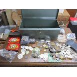 A cash tin containing various British coinage and medals to include a copper George III halfpenny,