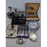 A mixed lot of silver and silver plate to include silver handled knives, silver napkin ring, a