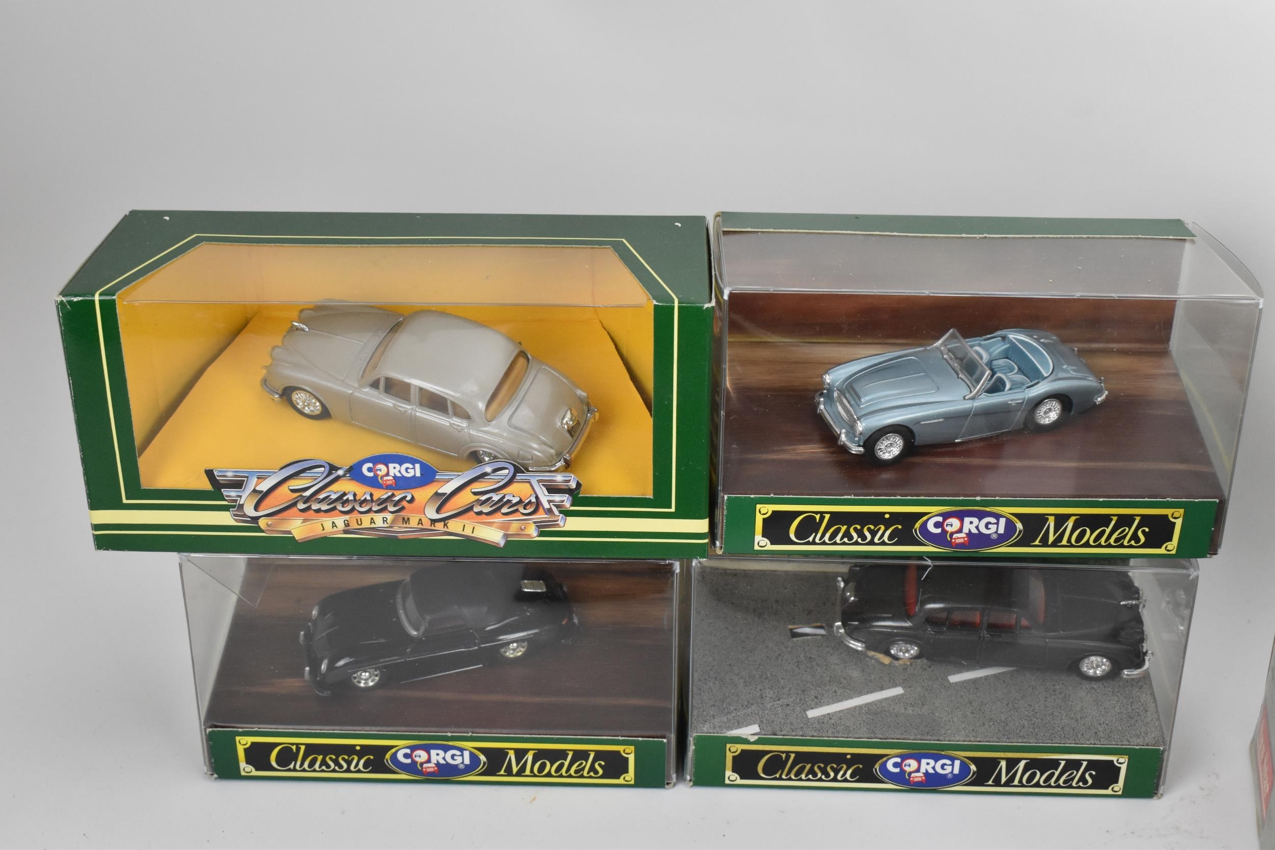 A group of boxed model cars to include a large 1:18 scale European collectables American Airlines - Image 7 of 11