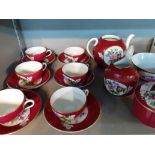 A late 19th/early 20th century Russian Imperial Gardner six setting tea set having a red ground with