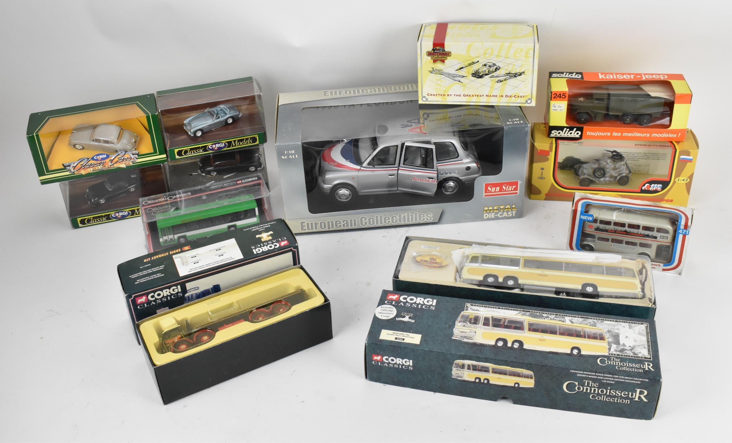 A group of boxed model cars to include a large 1:18 scale European collectables American Airlines