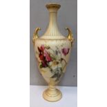 A Royal Worcester blush ivory hand painted porcelain vase with gilt scroll handles and decorated