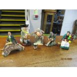A group of Royal Doulton figurines, Toby and character jugs to include Robert Burns HN3641, Falstaff