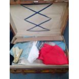 A vintage Kendle, Milne & Co canvas and leather clad trunk and contents to include fabric remnants