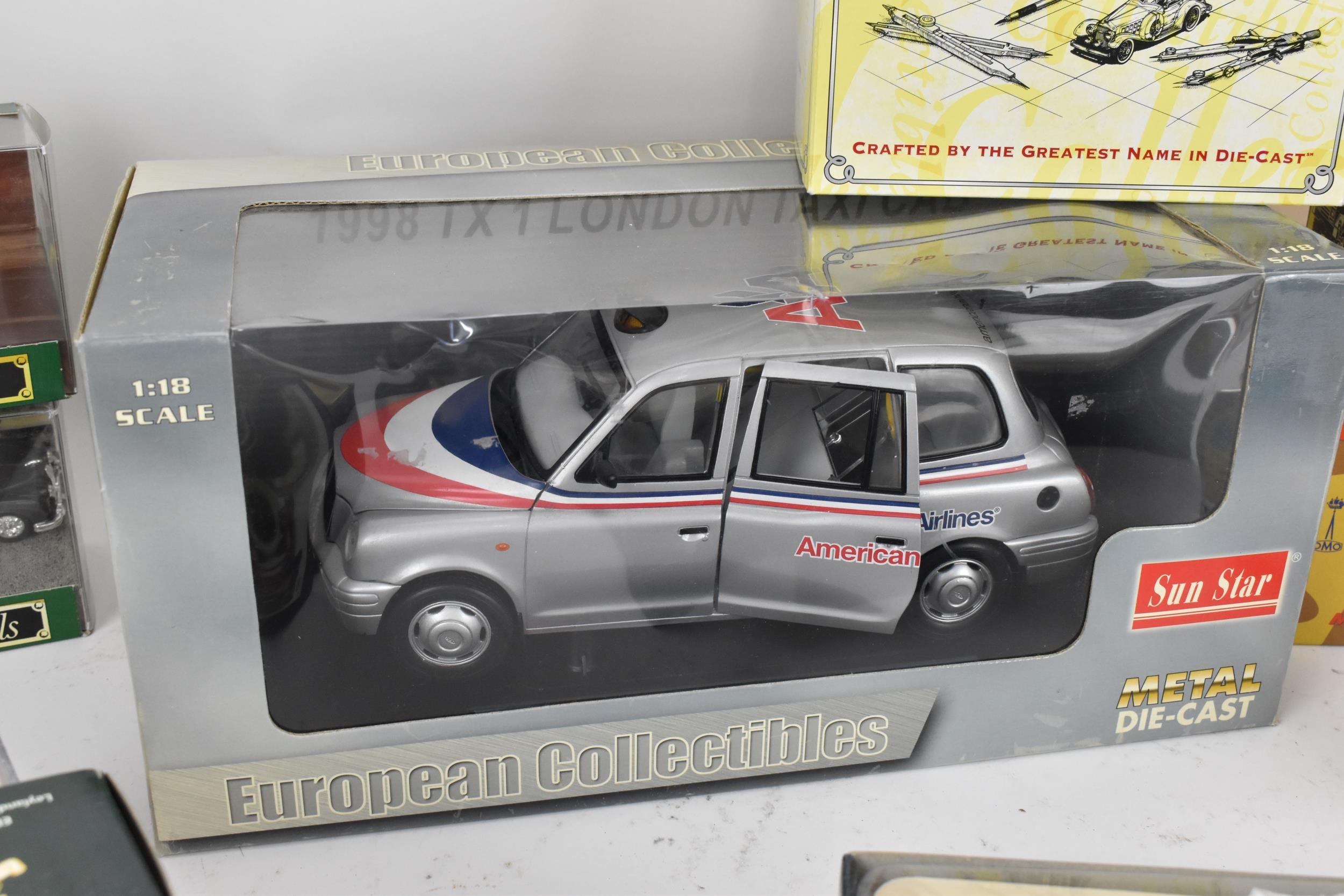 A group of boxed model cars to include a large 1:18 scale European collectables American Airlines - Image 9 of 11