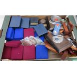 A box of shooting medals and trophies Location: