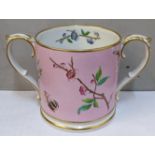 A 19th century Worcester twin-handled loving cup on a pink ground decorated with butterflies and