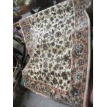 Two rugs: a hand woven rug, probably Iranian, having allover floral design on a white ground, triple