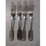 A set of four continental white metal forks engraved with family initials to the handles, 250.4g