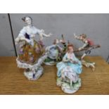 A 19th century Volkstedt porcelain figure of a dancing lady, 23.5 cm high, together with two