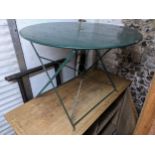 A French mid 20th century green painted metal folding garden/bistro table, 71cm x 97cm Location: