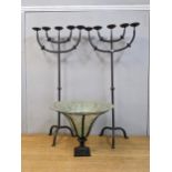 Two wrought metal candelabra and a metal framed glass bowl Location: