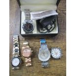 A boxed digital video watch, a Watch Time watch, an Eton quartz watch, a copy of a Breitling