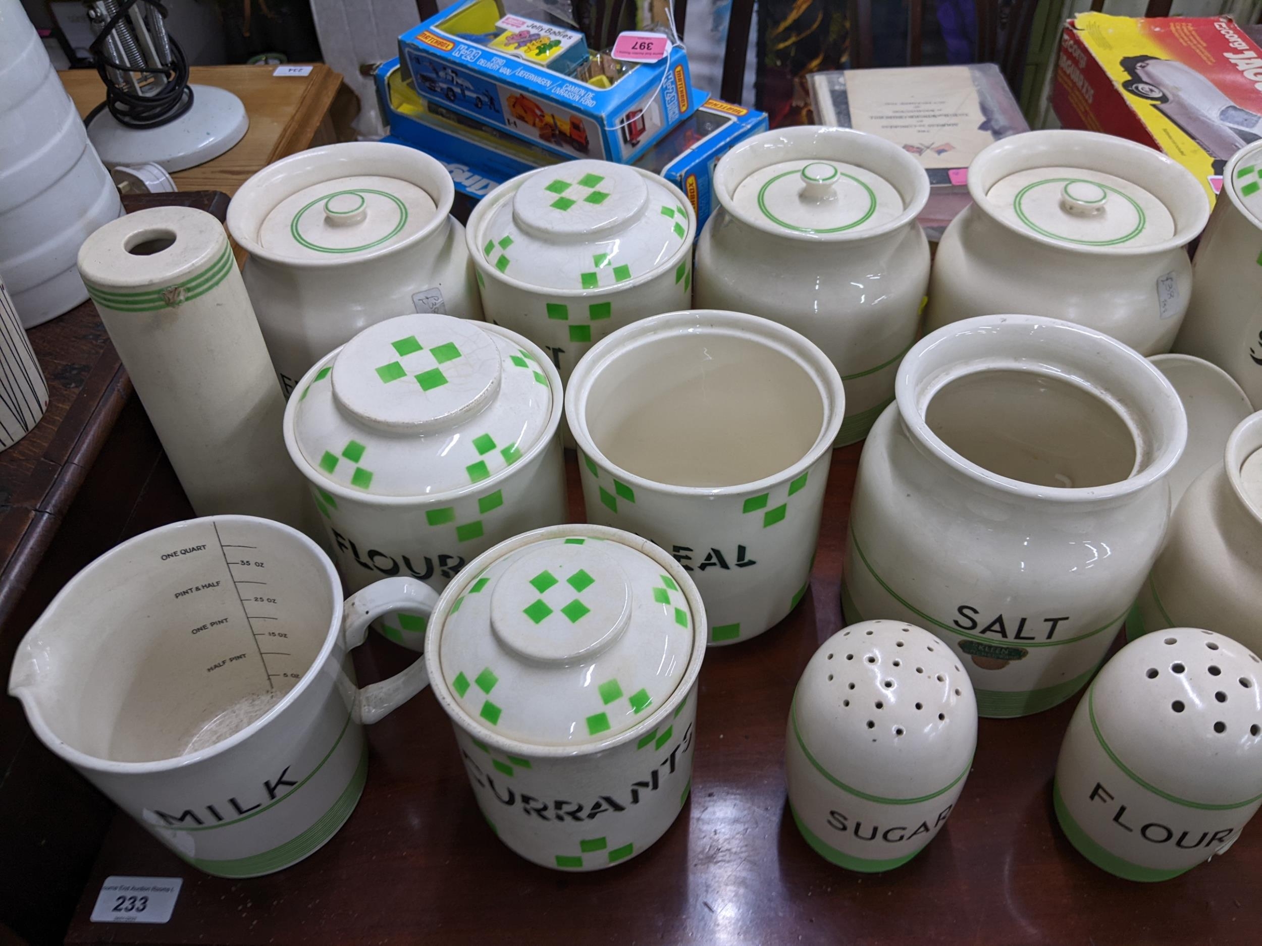 A quantity of early 20th century kitchen storage jars, some with lids having a cream glaze with - Bild 3 aus 3