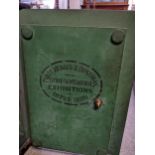 A Victorian cast iron safe bearing coat of arms to the front door and stamped to the inside 'Prize