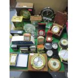 A mixed lot of mantel clocks, dressing table travel clocks, a William Widdop quartz carriage