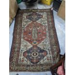A Persian Heriz style rug, 206cm x 133cm Location: