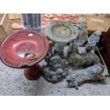 Small composition stone garden ornaments to include figures, two birdbaths, a pig and other items