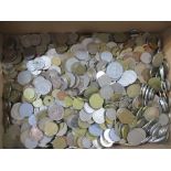 A collection of world coins, along with a small quantity of banknotes Location: