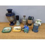 A collection of Royal Doulton china to include Slater patent vases and jug, a tankard, a figure