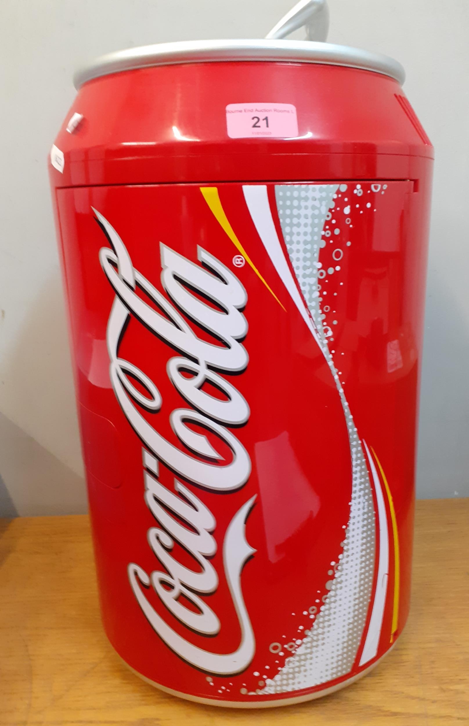 A modern Coca Cola advertising portable fridge Location: G