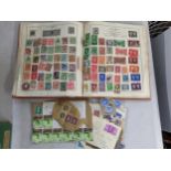 A stamp album containing mixed stamps from around the world Location: