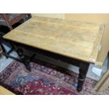 A Victorian pine panelled top table on black painted turned legs, 74cm h x 100cm w Location: