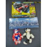 A boxed Scalextric 4 F1 Super Teams, a boxed Super puzzle 7500 pieces, and a group of soft toys