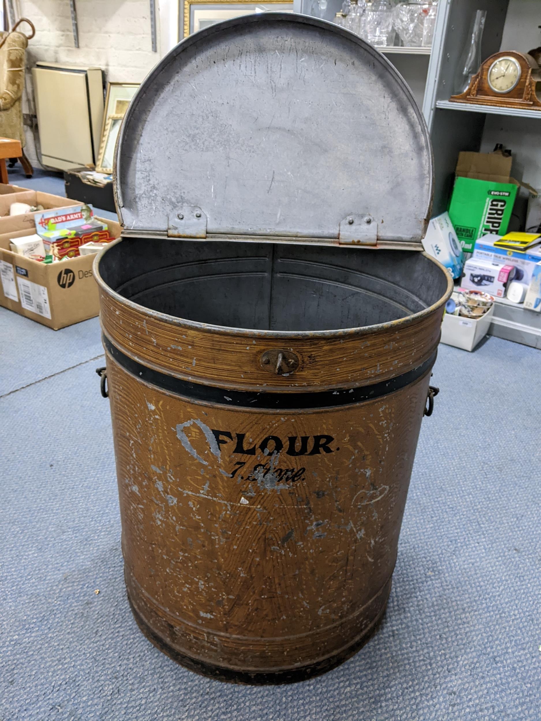 A Victorian metal painted flour bin with twin carrying handles and hinged lid 56.5cm h x 48cm w