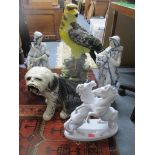 A selection of ceramic figurines and animals models and others to include a Keramos Viennese art