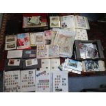 A mixed lot of ephemera and stamps to include The Meteor and Swift Sure albums of world stamps,