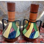 A pair of Royal Torquay Jazz pattern twin-handled vases A/F. Condition: chip to one rim Location: