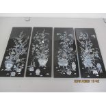 Four vintage Chinese black lacquered panels decorated with mother of pearl, 19.5cm x 49.5cm
